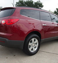 chevrolet traverse 2011 red suv lt gasoline 6 cylinders all whee drive 6 speed automatic 77521