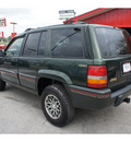 jeep grand cherokee 1995 green suv orvis gasoline 8 cylinders 4 wheel drive automatic 76543