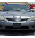 mitsubishi galant 2004 gray sedan es gasoline 4 cylinders front wheel drive automatic with overdrive 77023
