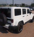 jeep wrangler unlimited 2012 white suv sahara gasoline 6 cylinders 4 wheel drive 6 speed manual 76051