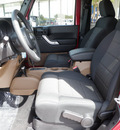 jeep wrangler 2011 red suv sahara gasoline 6 cylinders 4 wheel drive automatic 78611