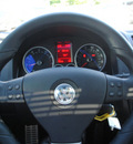 volkswagen gli 2009 black sedan gasoline 4 cylinders front wheel drive 6 speed manual 75034