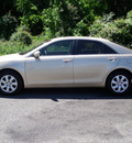 toyota camry 2011 tan sedan le gasoline 4 cylinders front wheel drive automatic 75672