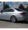 bmw 335i 2009 gray coupe gasoline 6 cylinders rear wheel drive automatic 77002