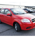 chevrolet aveo 2011 red sedan lt gasoline 4 cylinders front wheel drive automatic 77017