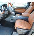 jeep grand cherokee 2012 black suv overland gasoline 6 cylinders 4 wheel drive automatic 77375