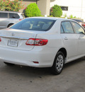 toyota corolla 2011 white sedan le gasoline 4 cylinders front wheel drive automatic with overdrive 77074