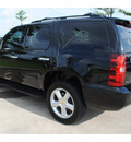 chevrolet tahoe 2011 black suv ls flex fuel 8 cylinders 2 wheel drive automatic with overdrive 77539
