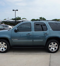 gmc yukon 2009 blue suv slt 8 cylinders automatic 76087