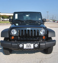 jeep wrangler unlimited 2012 black suv sport gasoline 6 cylinders 4 wheel drive automatic 76011