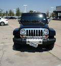 jeep wrangler unlimited 2009 black suv sahara gasoline 6 cylinders 2 wheel drive automatic with overdrive 76137