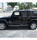 jeep wrangler unlimited 2008 black suv sahara gasoline 6 cylinders 4 wheel drive automatic 78624