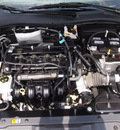 ford focus 2011 black sedan sport ses 4 cylinders automatic 76049