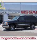 gmc yukon 2004 black suv slt 8 cylinders automatic 79119