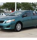 toyota corolla 2010 dk  green sedan gasoline 4 cylinders front wheel drive automatic 78232