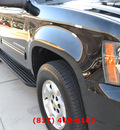 chevrolet suburban 2012 black suv lt 1500 w dvd flex fuel 8 cylinders 4 wheel drive automatic 76051