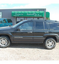 jeep grand cherokee 2004 black suv laredo 6 cylinders automatic with overdrive 77575