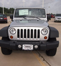 jeep wrangler 2012 bright silver suv sport gasoline 6 cylinders 4 wheel drive automatic 77375