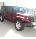 jeep wrangler unlimited 2007 red suv sahara gasoline 6 cylinders 4 wheel drive automatic with overdrive 77656