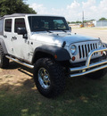 jeep wrangler 2012 silver suv unlimited sport gasoline 6 cylinders 4 wheel drive automatic 75067