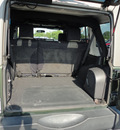 jeep wrangler unlimited 2007 green suv sahara gasoline 6 cylinders 4 wheel drive manual 37087