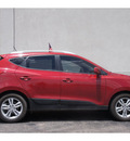 hyundai tucson 2010 dk  red suv gls gasoline 4 cylinders all whee drive automatic 79407