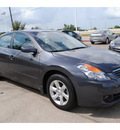 nissan altima 2009 gray sedan sl gasoline 4 cylinders front wheel drive automatic with overdrive 77598