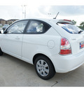 hyundai accent 2011 white hatchback gs gasoline 4 cylinders front wheel drive 5 speed manual 77034