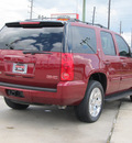 gmc yukon 2009 dk  red suv slt xfe flex fuel 8 cylinders 2 wheel drive automatic with overdrive 77469