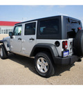 jeep wrangler unlimited 2012 silver suv sport gasoline 6 cylinders 4 wheel drive automatic 76645