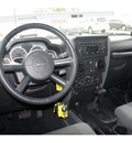 jeep wrangler unlimited 2007 black suv sahara gasoline 6 cylinders 4 wheel drive automatic 79110