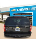 chevrolet tahoe 2013 black suv lt flex fuel v8 2 wheel drive automatic 75067