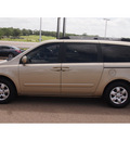 kia sedona 2008 gold van lx gasoline 6 cylinders front wheel drive automatic with overdrive 77859