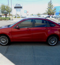 ford focus 2011 red sedan gasoline 4 cylinders front wheel drive automatic 79936