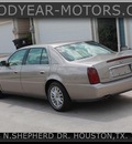 cadillac deville 2000 brown sedan gasoline 8 cylinders front wheel drive automatic 77008