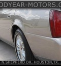 cadillac deville 2000 brown sedan gasoline 8 cylinders front wheel drive automatic 77008