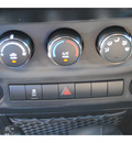 jeep wrangler 2011 black suv sport gasoline 6 cylinders 4 wheel drive 6 speed manual 77065