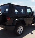 jeep wrangler 2012 black suv sport gasoline 6 cylinders 4 wheel drive 6 speed manual 76011