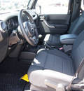 jeep wrangler 2012 black suv sport gasoline 6 cylinders 4 wheel drive 6 speed manual 76011