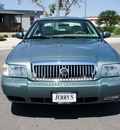 mercury grand marquis 2006 green sedan gs flex fuel 8 cylinders rear wheel drive automatic with overdrive 76087