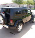 jeep wrangler unlimited 2009 black suv sahara gasoline 6 cylinders 4 wheel drive automatic 76049