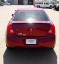 pontiac g6 2009 red sedan 4 cylinders automatic 76049