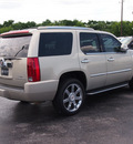 cadillac escalade 2010 gold suv luxury flex fuel 8 cylinders all whee drive shiftable automatic 77074