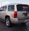 cadillac escalade 2010 gold suv luxury flex fuel 8 cylinders all whee drive shiftable automatic 77074