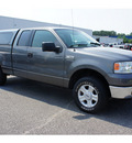 ford f 150 2006 dark shadow grey xlt gasoline 8 cylinders 4 wheel drive automatic with overdrive 07712