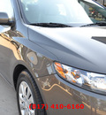 kia forte 2011 gold sedan ex gasoline 4 cylinders front wheel drive automatic 76051