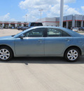 toyota camry 2011 green sedan le gasoline 4 cylinders front wheel drive automatic with overdrive 77469