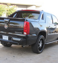 cadillac escalade ext 2009 black suv flex fuel 8 cylinders 4 wheel drive automatic with overdrive 77074