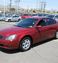 nissan altima 2006 red sedan gasoline 4 cylinders front wheel drive automatic 79925