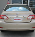 toyota corolla 2011 tan sedan le gasoline 4 cylinders front wheel drive automatic with overdrive 77090